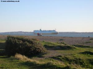 A large boat passes along the Solent