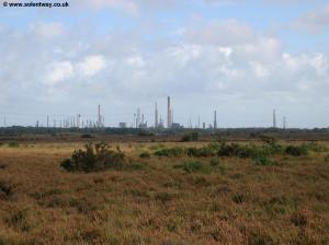 The towers of Fawley Refinery in the distance